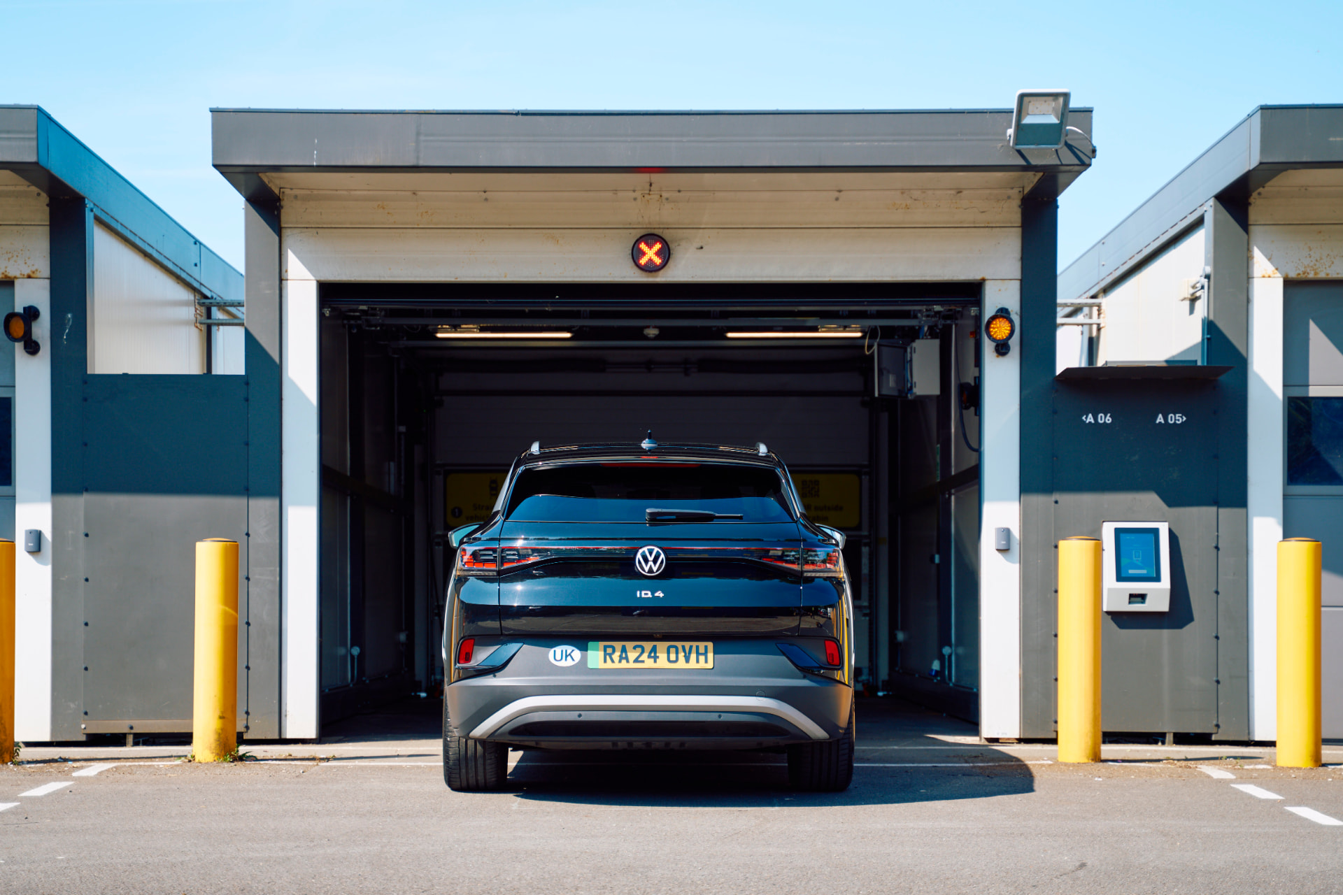 The car enters the robotic parking cabin